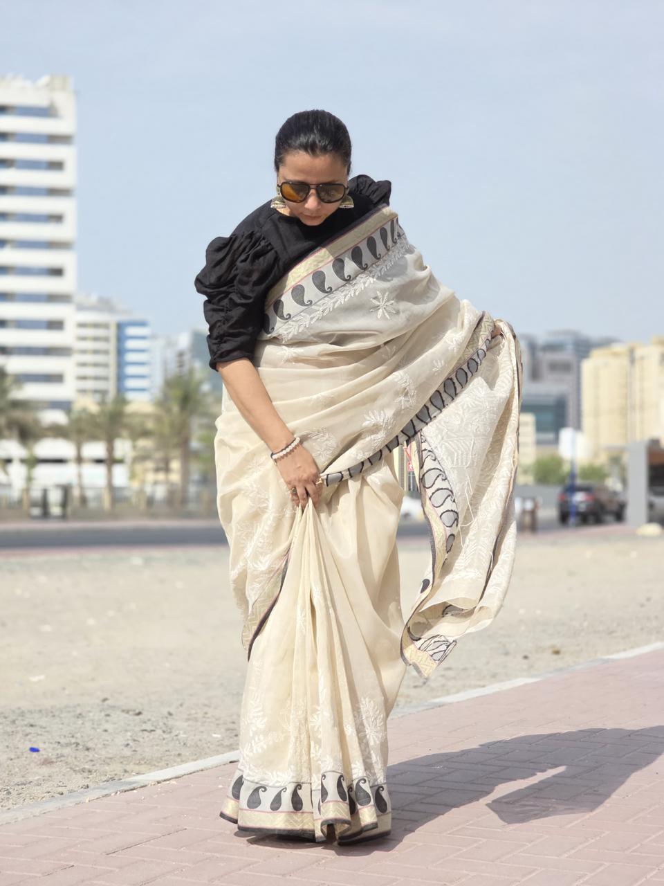 Rehnuma – Beige Nalli Silk Saree with Black‑and‑White Motif Border