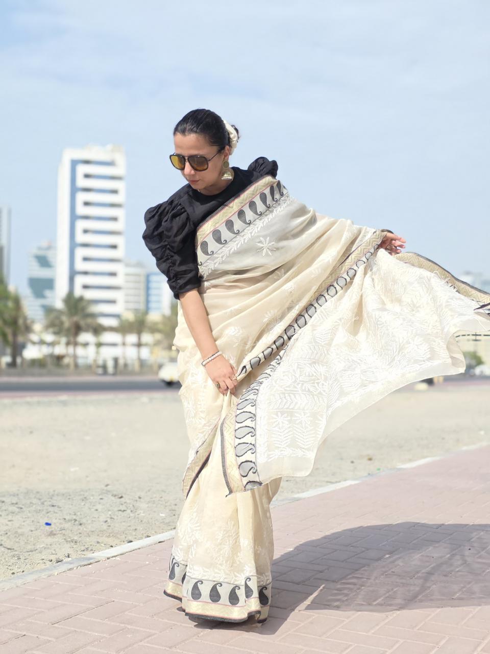 Rehnuma – Beige Nalli Silk Saree with Black‑and‑White Motif Border